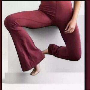 NWOT Free people movement good karma flares in burgundy m/l